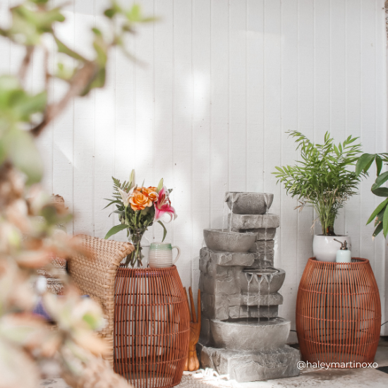 A three-tier water fountain in the outdoor living space